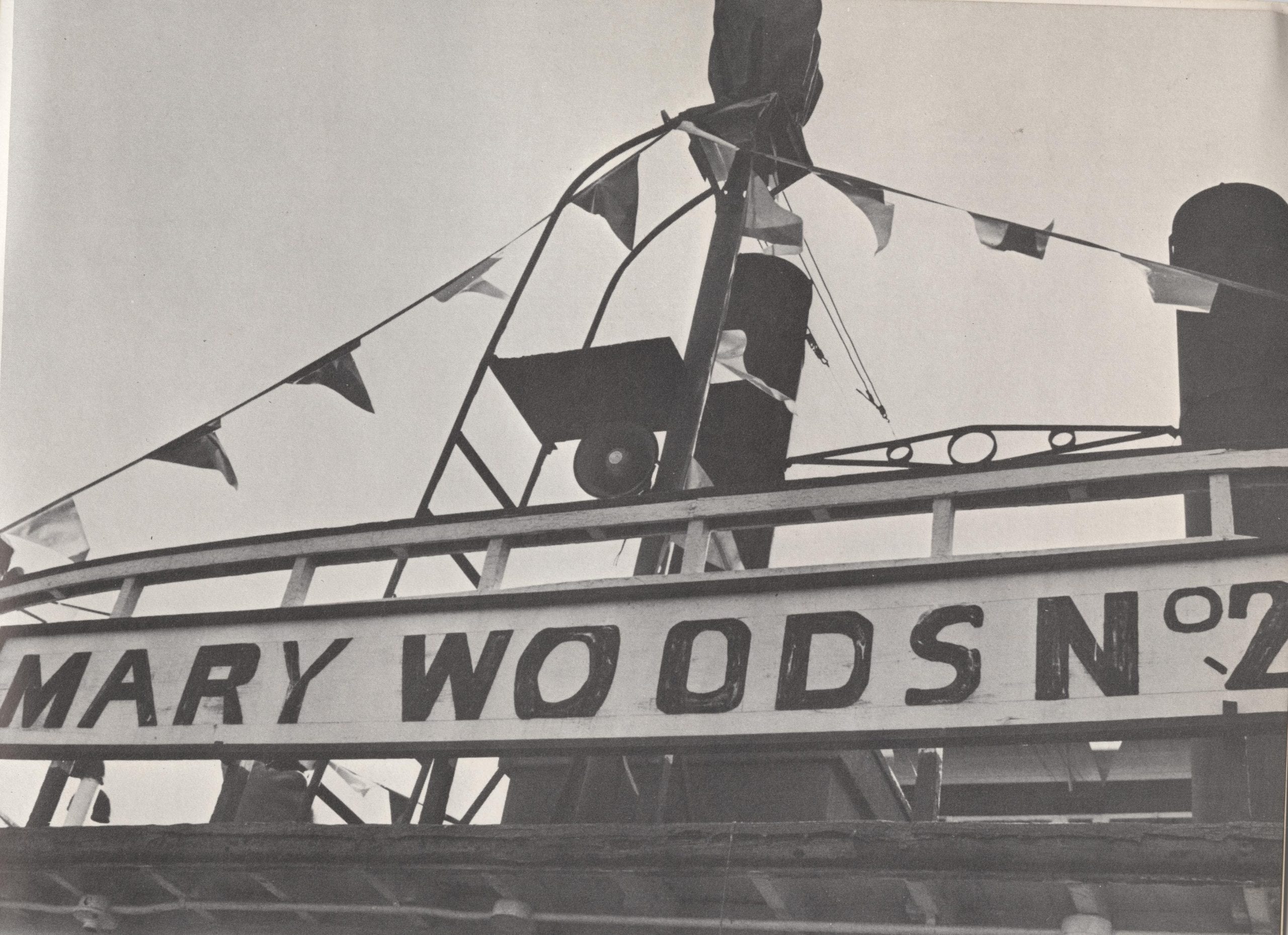 1968 – Mary Woods Number 2 with Sign and Flags